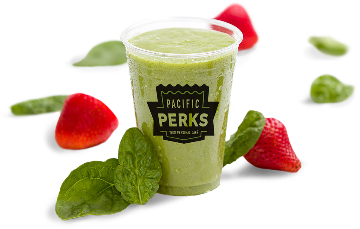 a green smoothie from Pacific Perks with strawberries and mint leaves around it