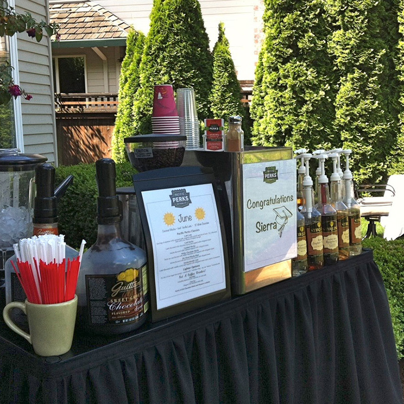 Pacific Perks espresso mobile café at an outdoor graduation party
