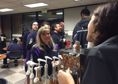 a group of Fed Ex teammates at a Pacific Perks espresso mobile café