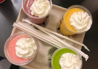 4 Pacific Perks smoothies sitting in a drink tray