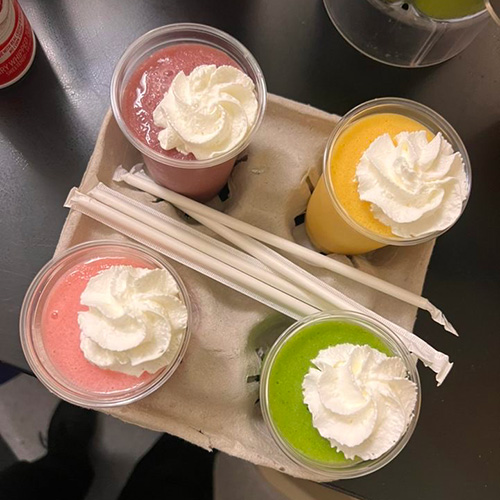 4 Pacific Perks smoothies sitting in a drink tray