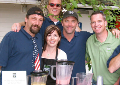 Natalie Fairchild with the crew of Deadliest Catch at a Pacific Perks smoothie mobile café