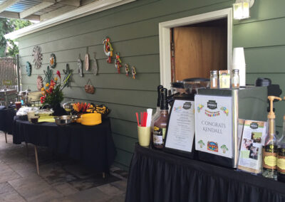 a Pacific Perks coffee bar at an outdoor graduation party