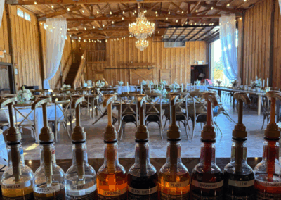 A row of Pacific Perks syrups overlooking a beautiful wedding venue