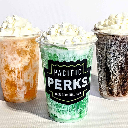 Three dirty sodas from a Pacific Perks Coffee mobile café with marshmallows and whipped cream