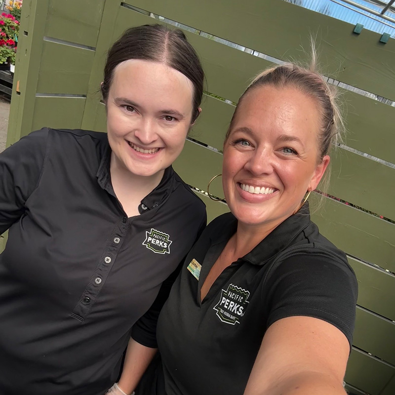 Two Pacific Perks Perkologists smiling for a selfie while hosting an event Two Pacific Perks Perkologists smiling for a selfie while hosting an event